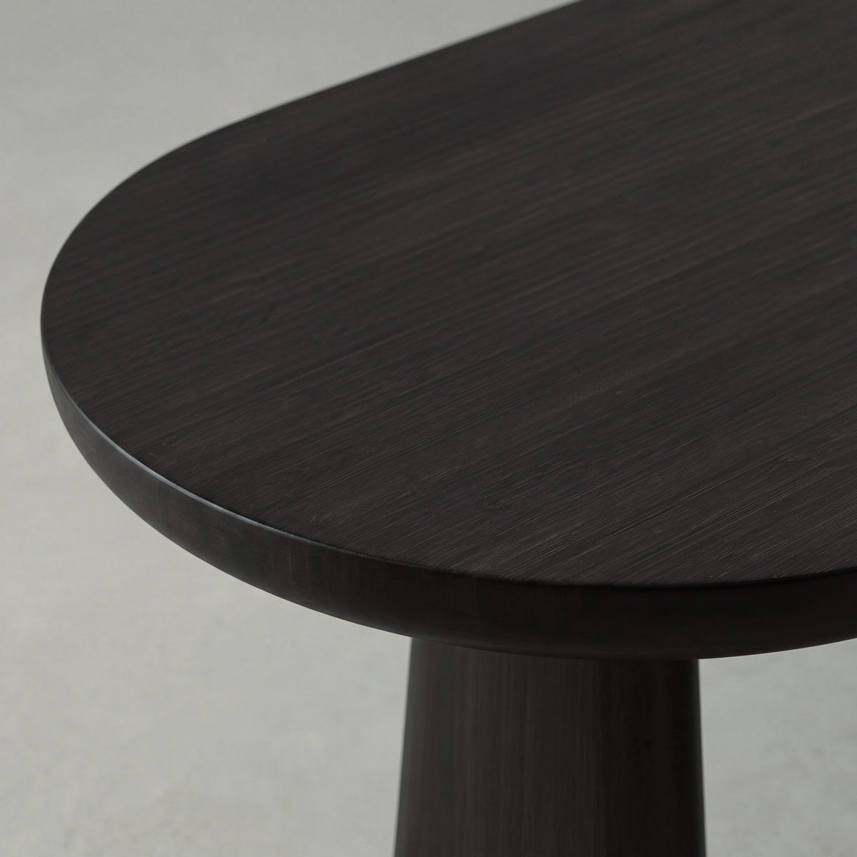 Close-up of the top and bamboo grain on the Greenington Zephyr Console Table in Caviar bamboo