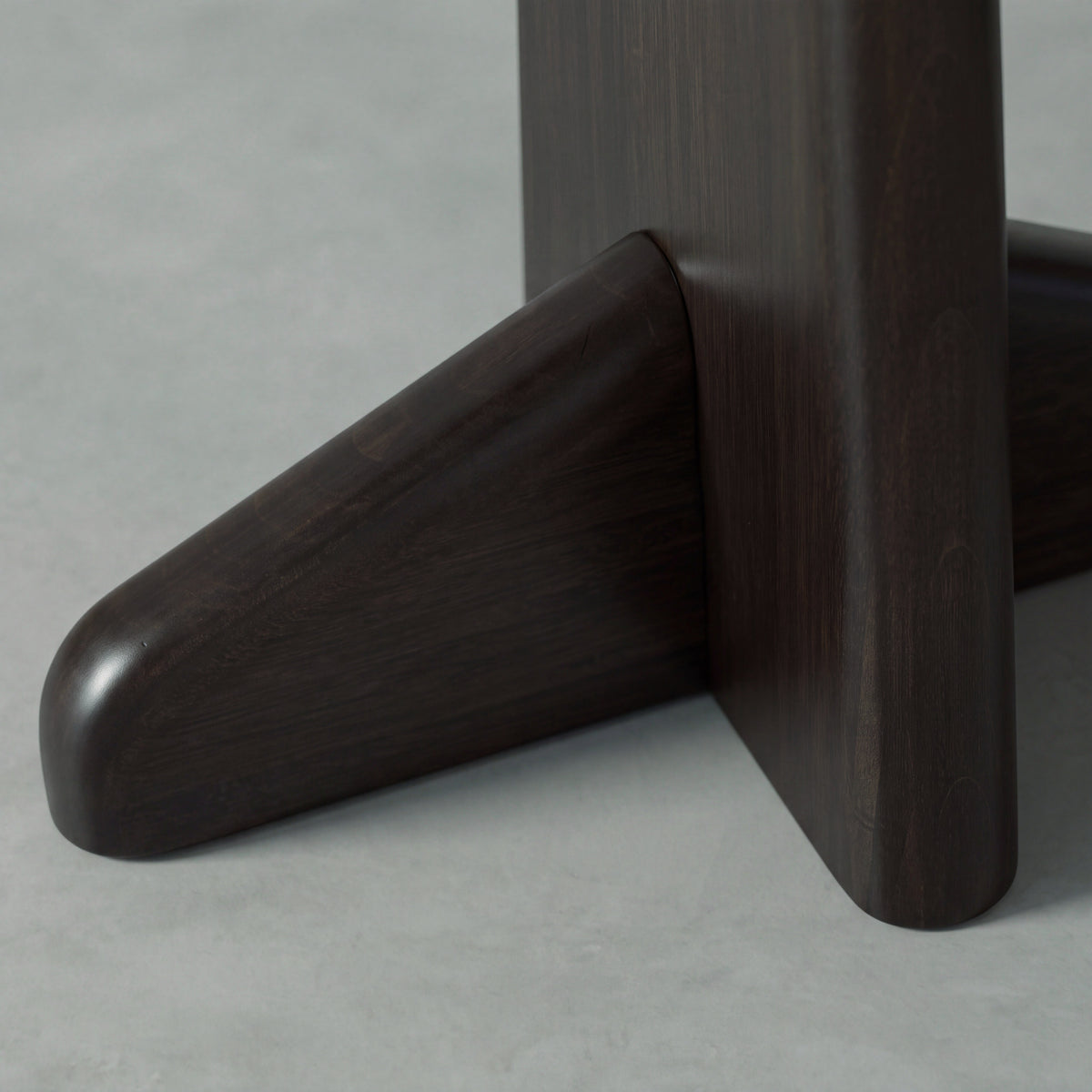 Close-up of the leg on the Greenington Zephyr Console Table in Caviar bamboo