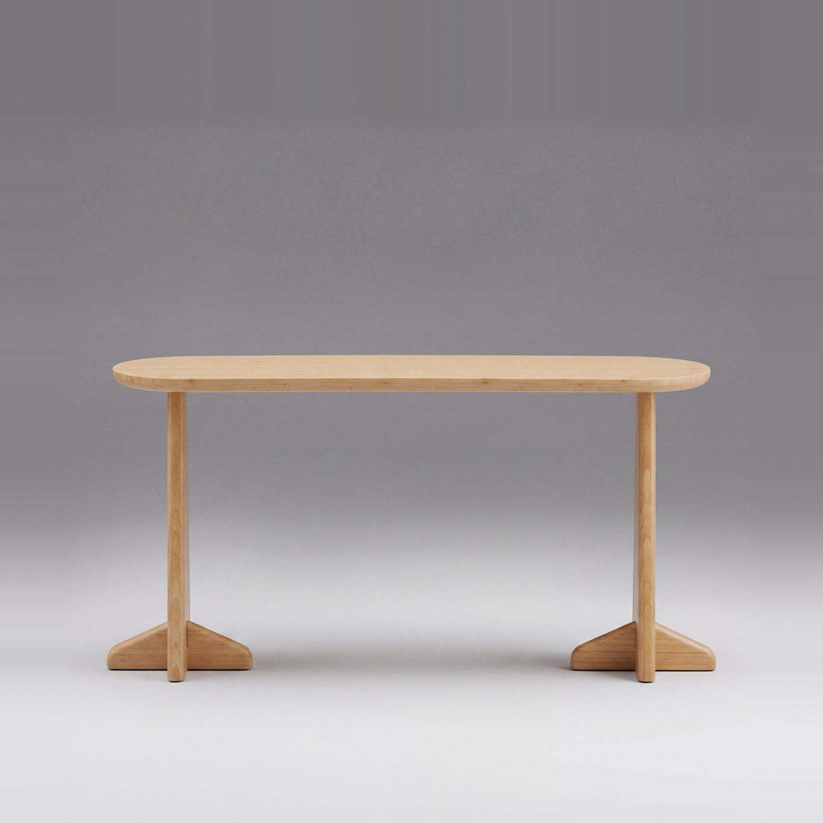 Greenington Zephyr Console Table in Wheat bamboo, on a studio background