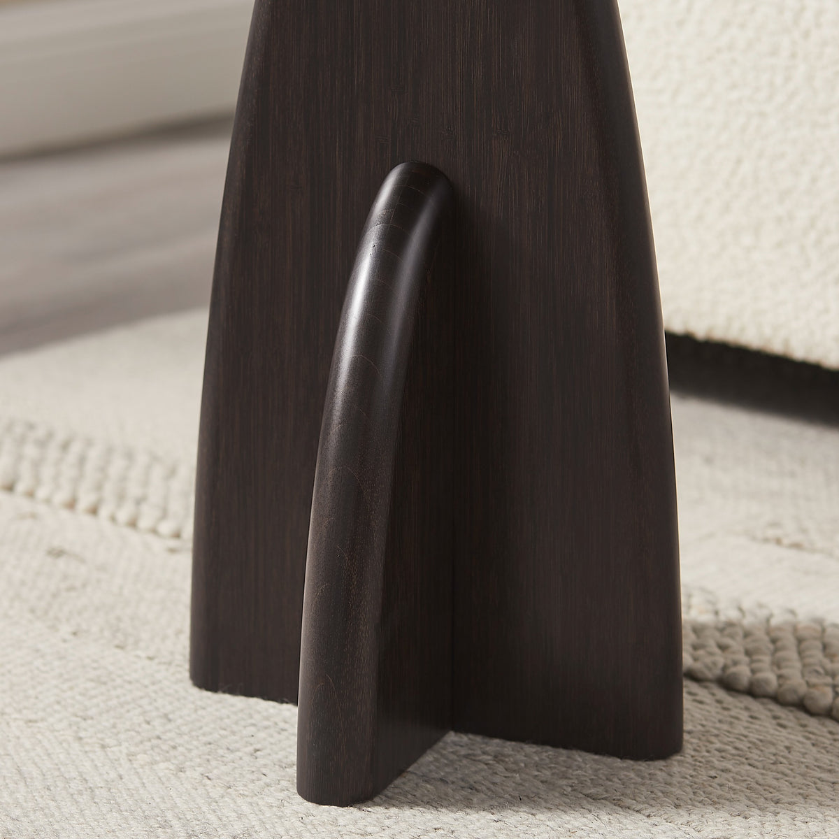 Close-up of the leg on the Greenington Zephyr Side Table in Caviar bamboo