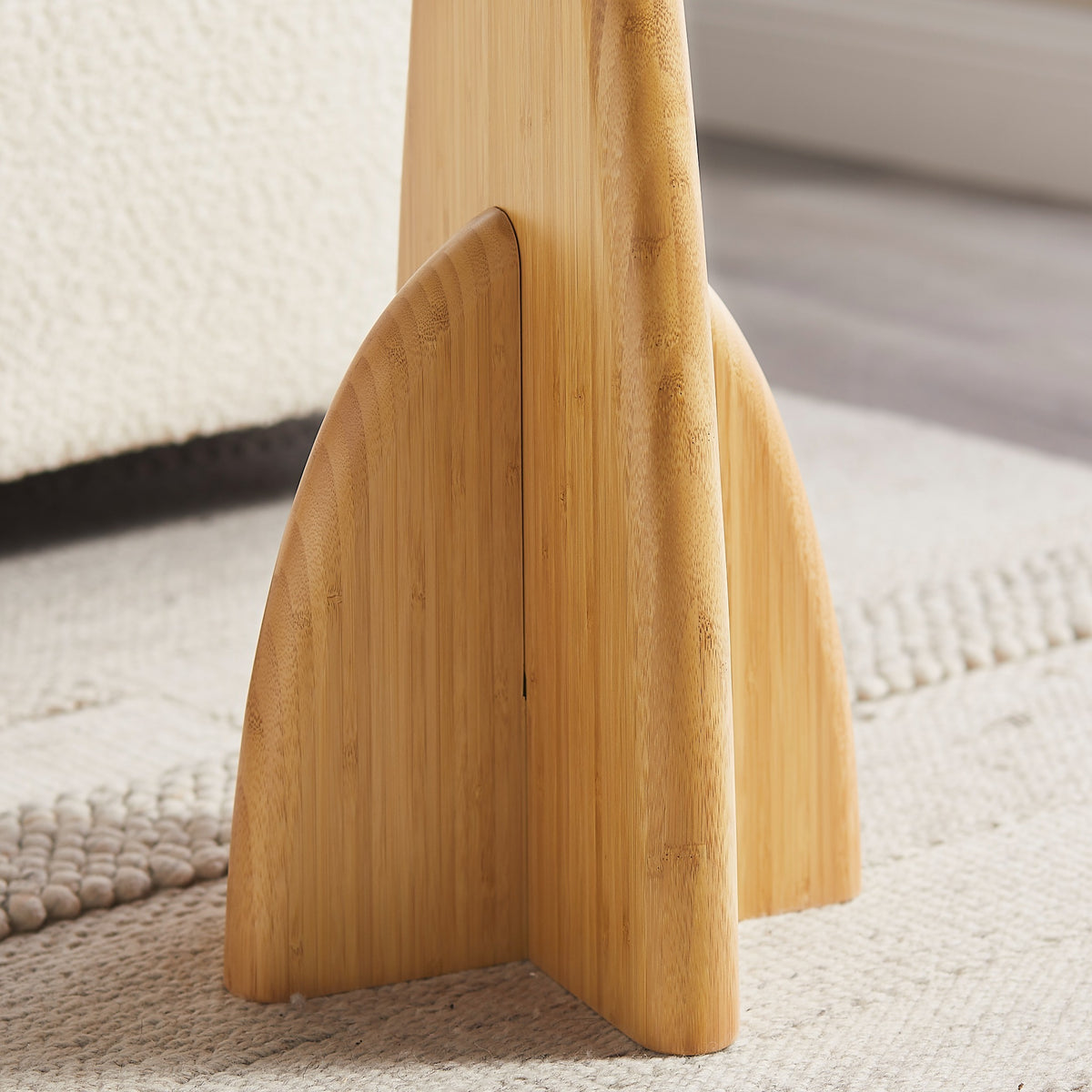 Close-up of the leg on the Greenington Zephyr Side Table in Wheat bamboo
