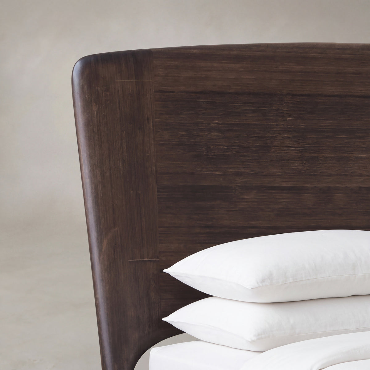Close-up of the headboard on the Greenington Zeva Platform Bed in Black Walnut bamboo