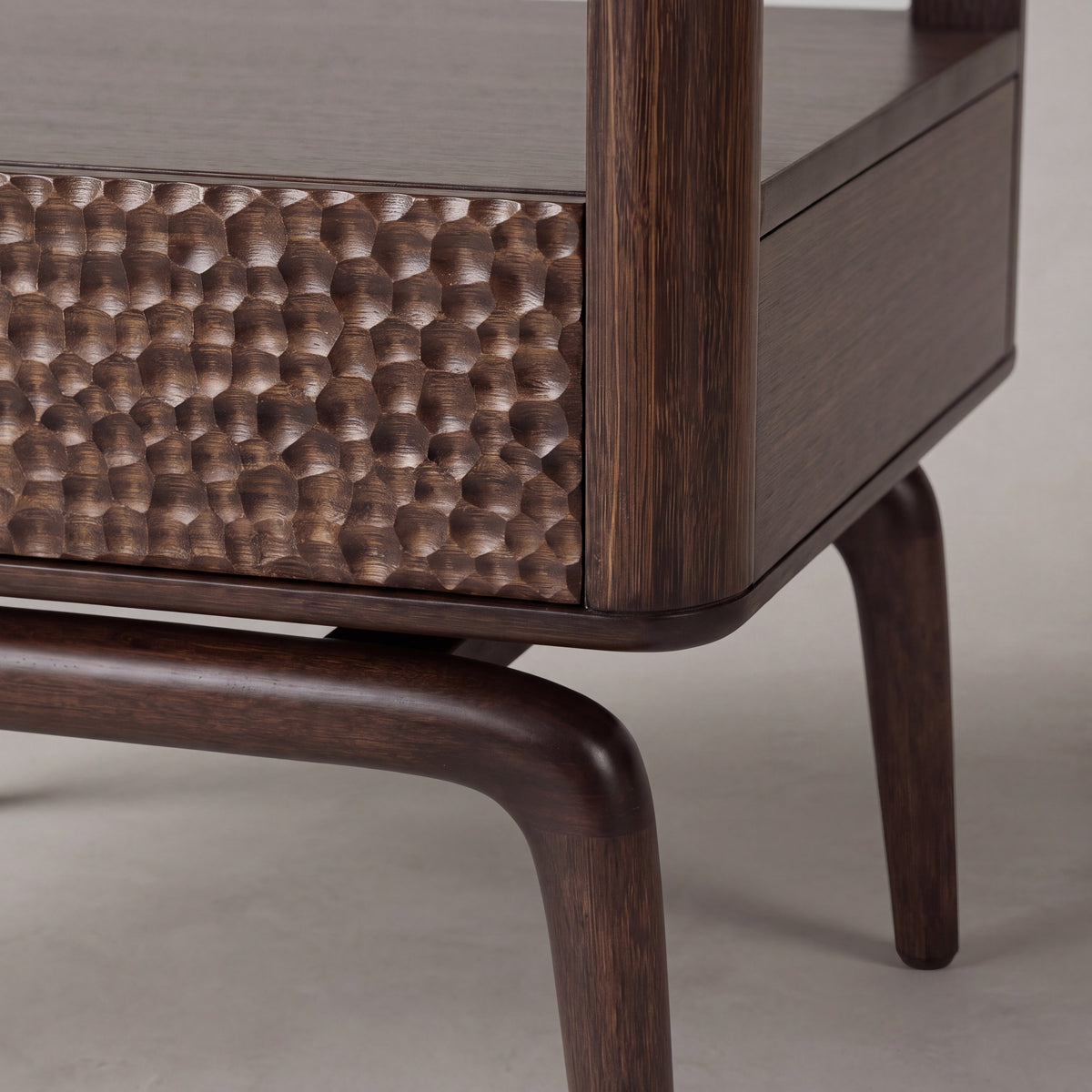 Close-up of the leg on the Greenington Zeva Nightstand in Black Walnut bamboo