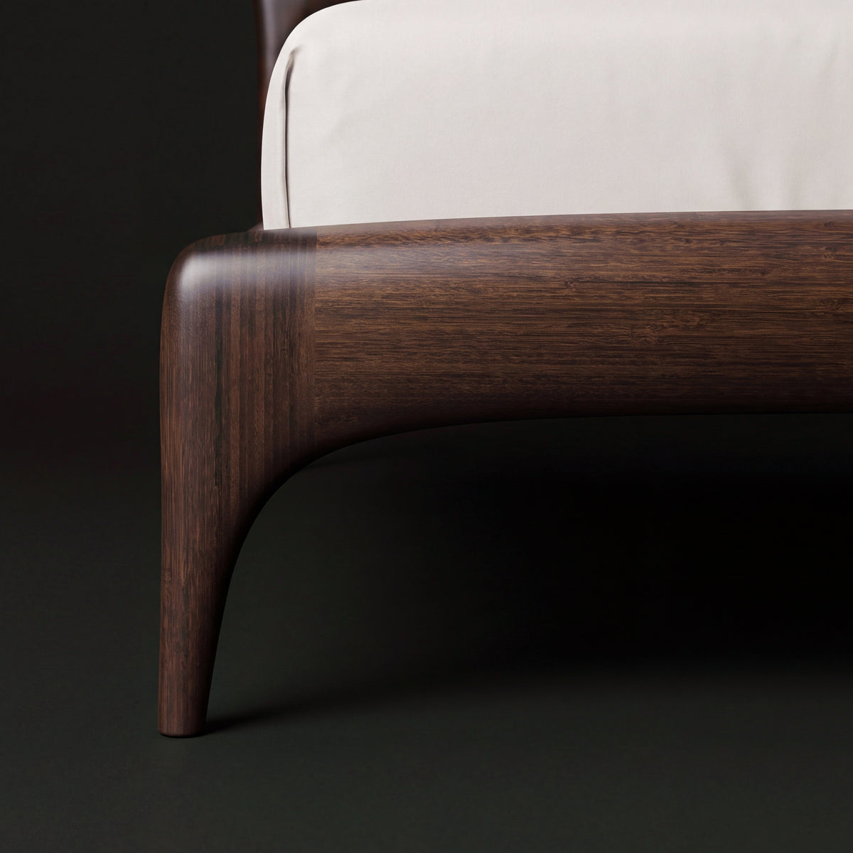 Greenington Zeva Platform Bed in Black Walnut bamboo, close-up of the curved leg