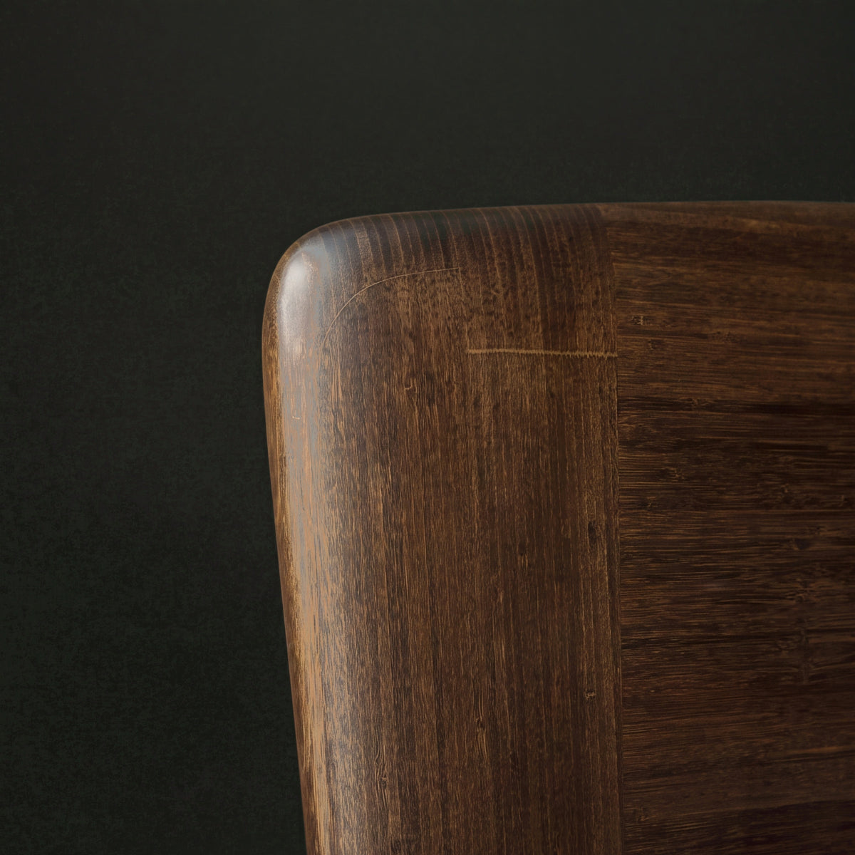 Greenington Zeva Platform Bed in Black Walnut bamboo, close-up of the rounded corner