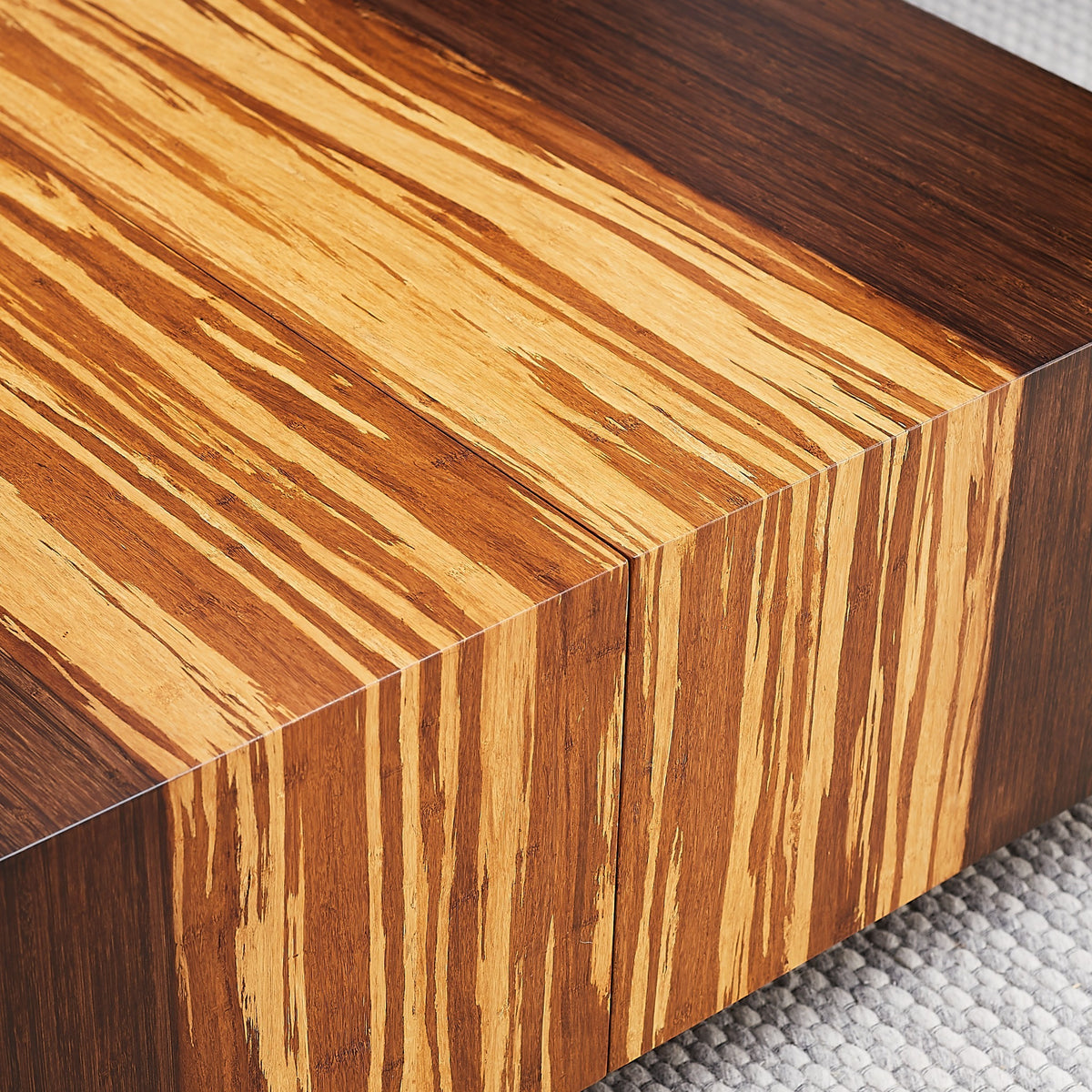 Close-up of the top and bamboo grain on the Greenington Azara Cube Rectangular Coffee Table in Sable bamboo