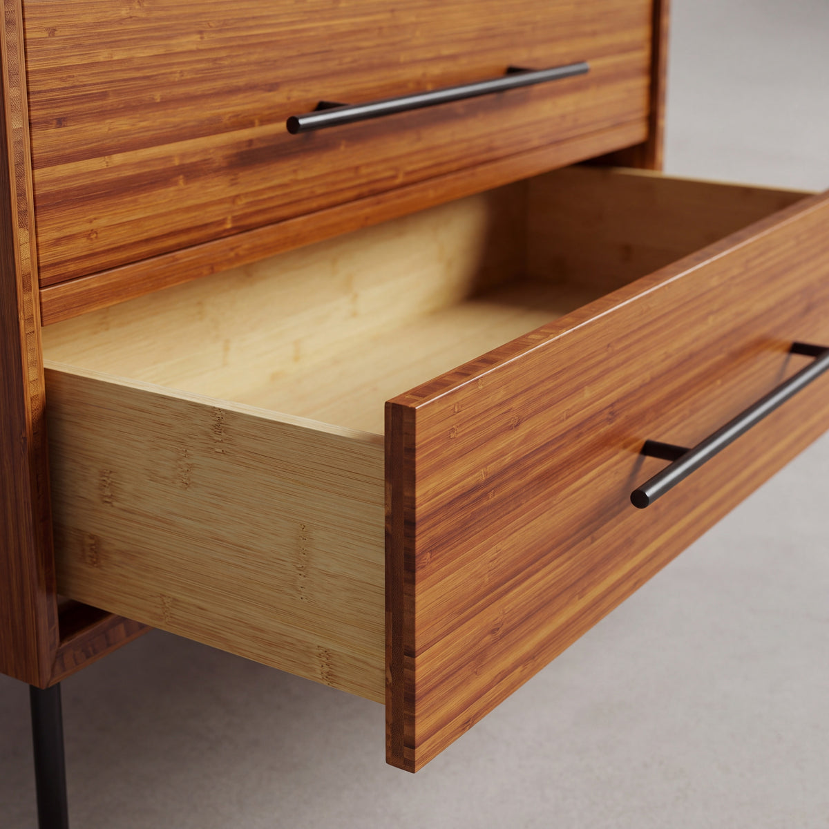 Close-up of the drawer and pull on the Greenington Taylor Chest in Amber bamboo