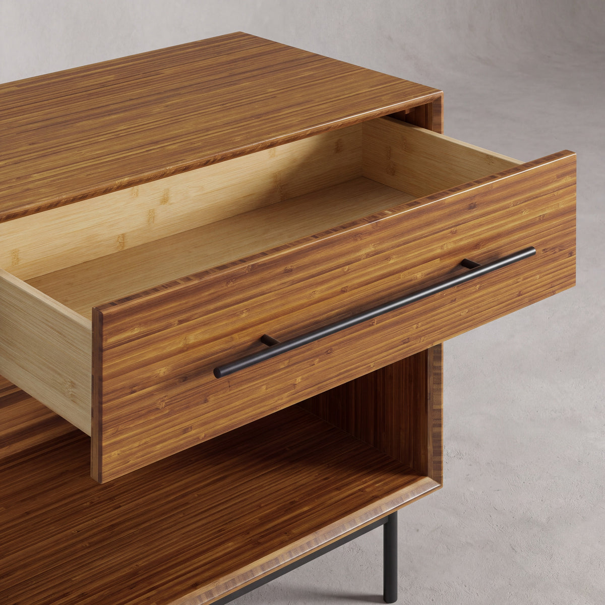 Close-up of the drawer and pull on the Greenington Taylor Nightstand in Amber bamboo