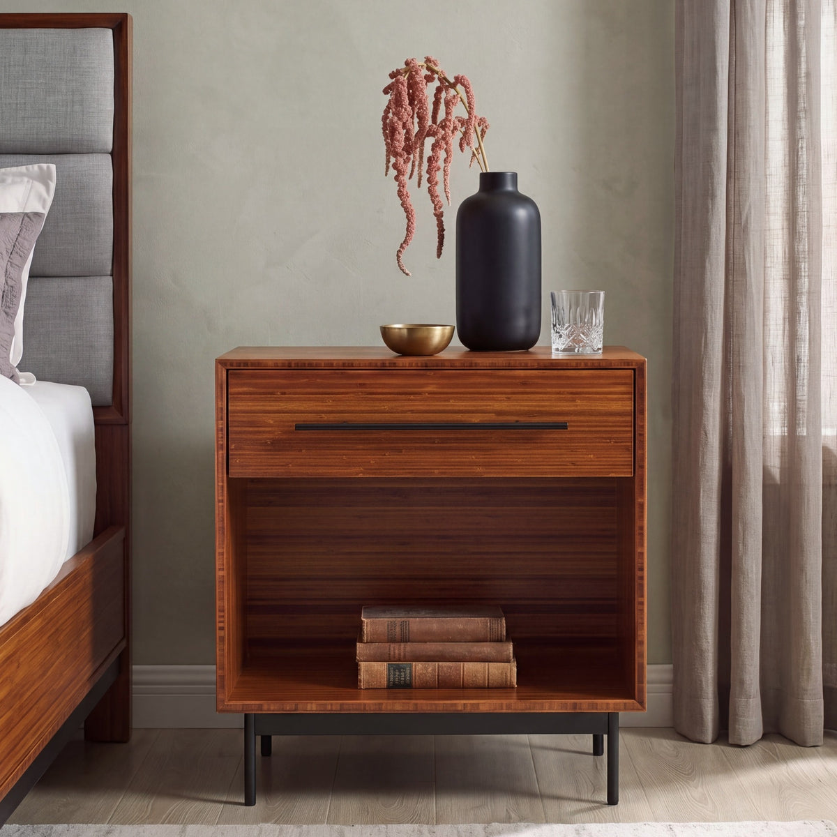Greenington Taylor Nightstand in Amber bamboo, shown in a bedroom