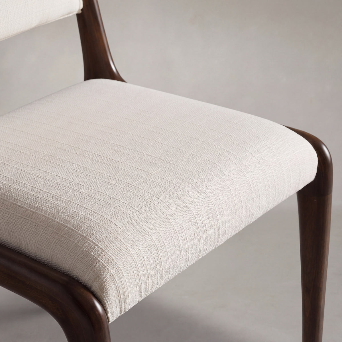 Close-up of the seat on the Greenington Torino Dining Chair in Black Walnut bamboo