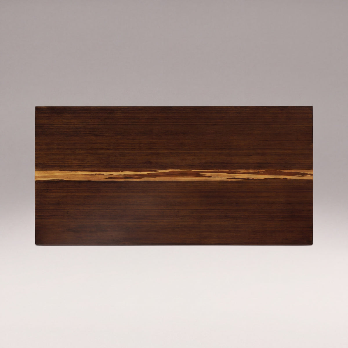 Close-up of the top and bamboo grain on the Greenington Torrey Dining Table in Black Walnut bamboo